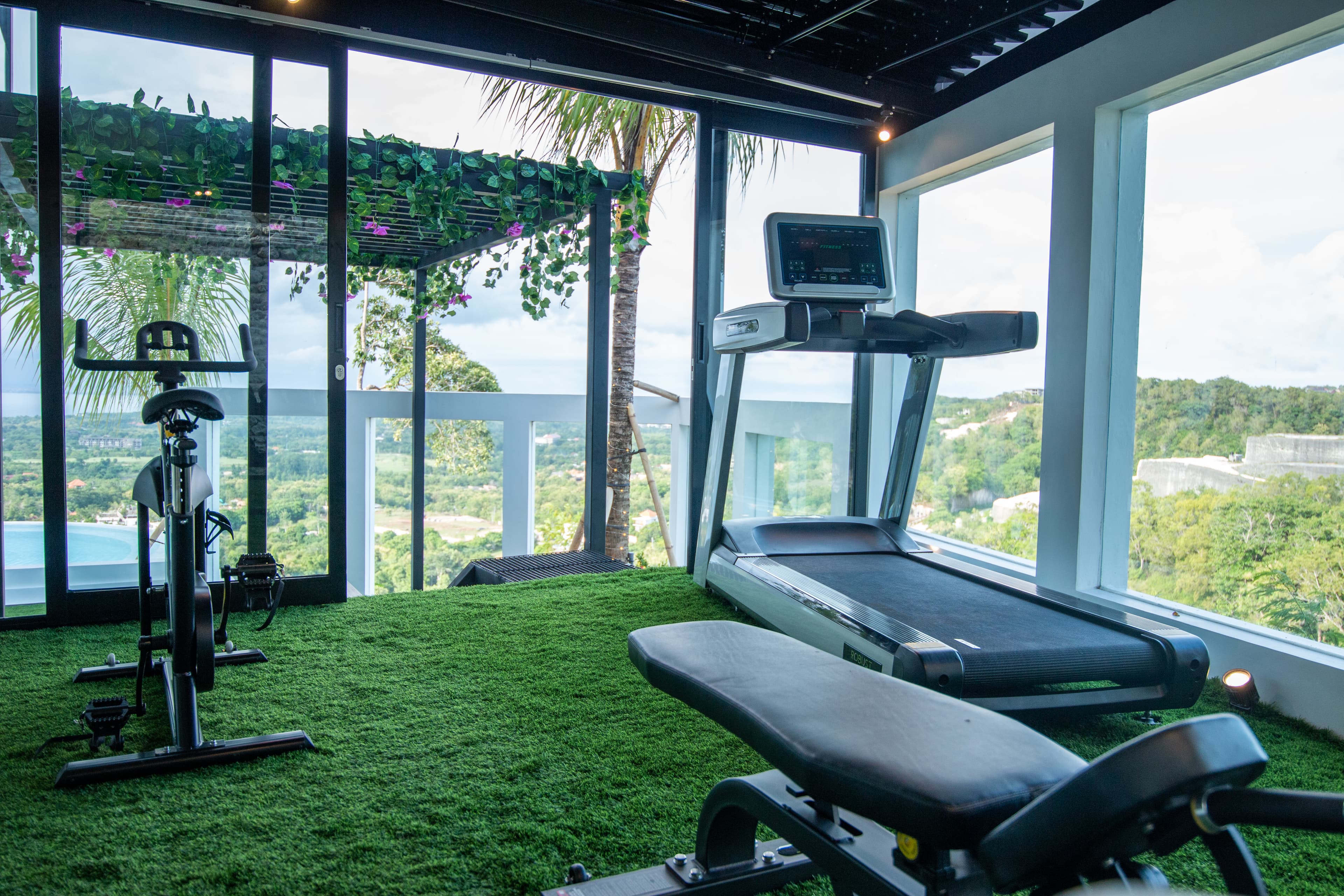 Bingin Hill Villa — gym with ocean and sunrise views