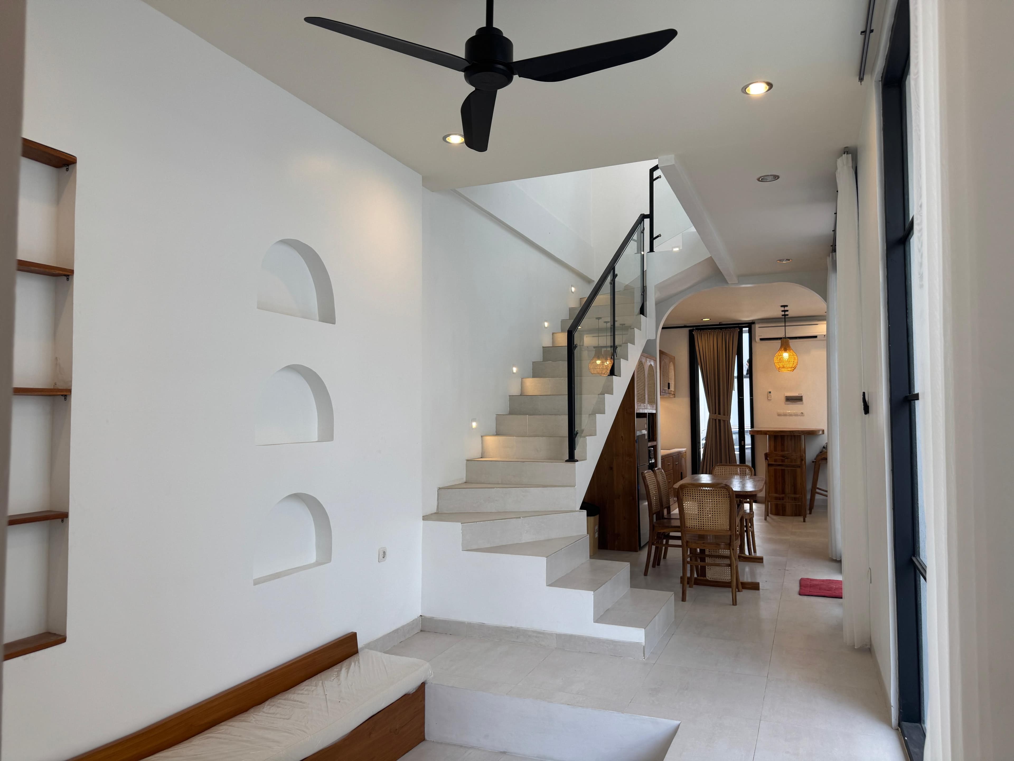 Infinity Villa — interior staircase and living area