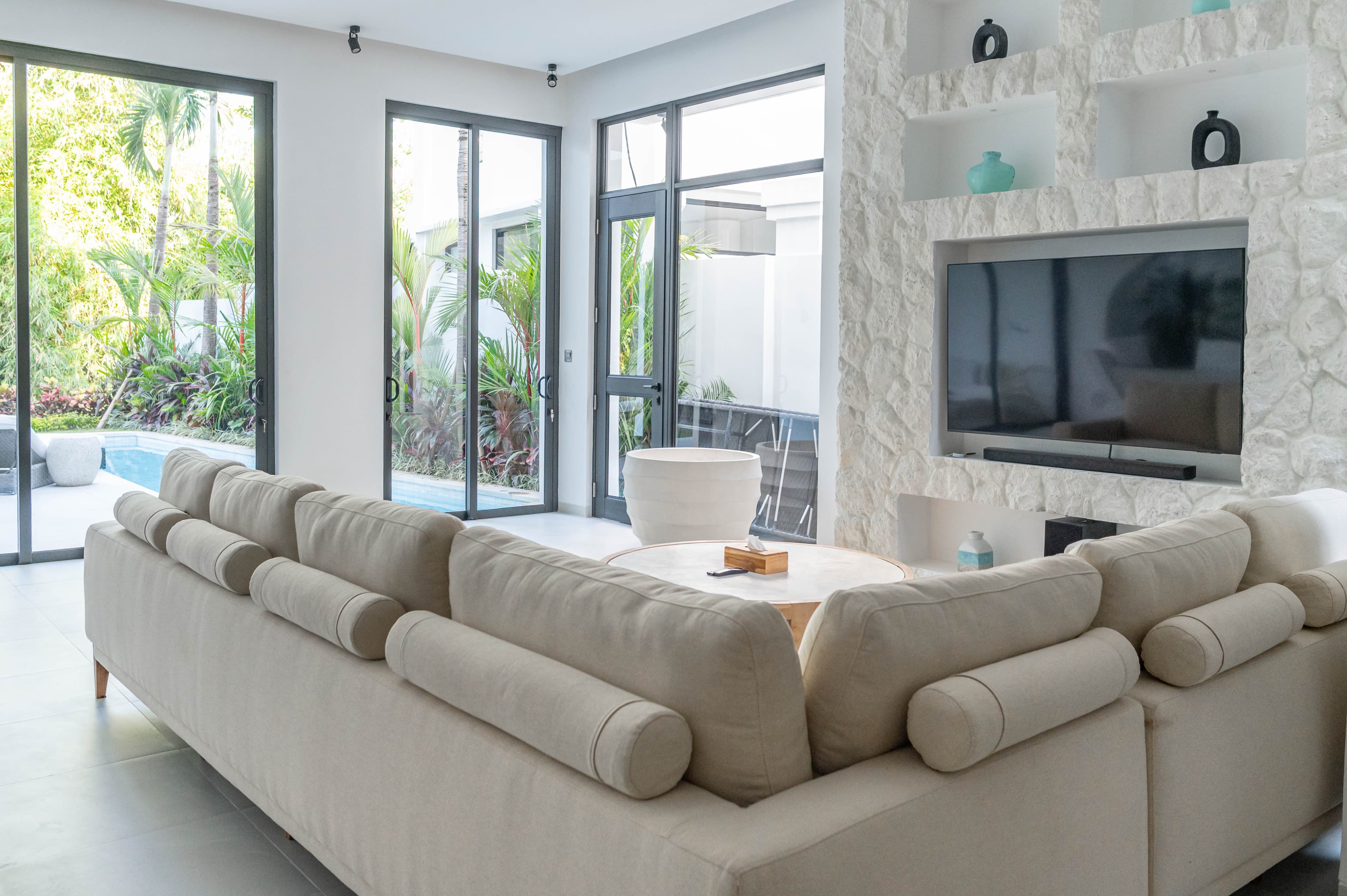 River View 4 — lounge with stone feature wall