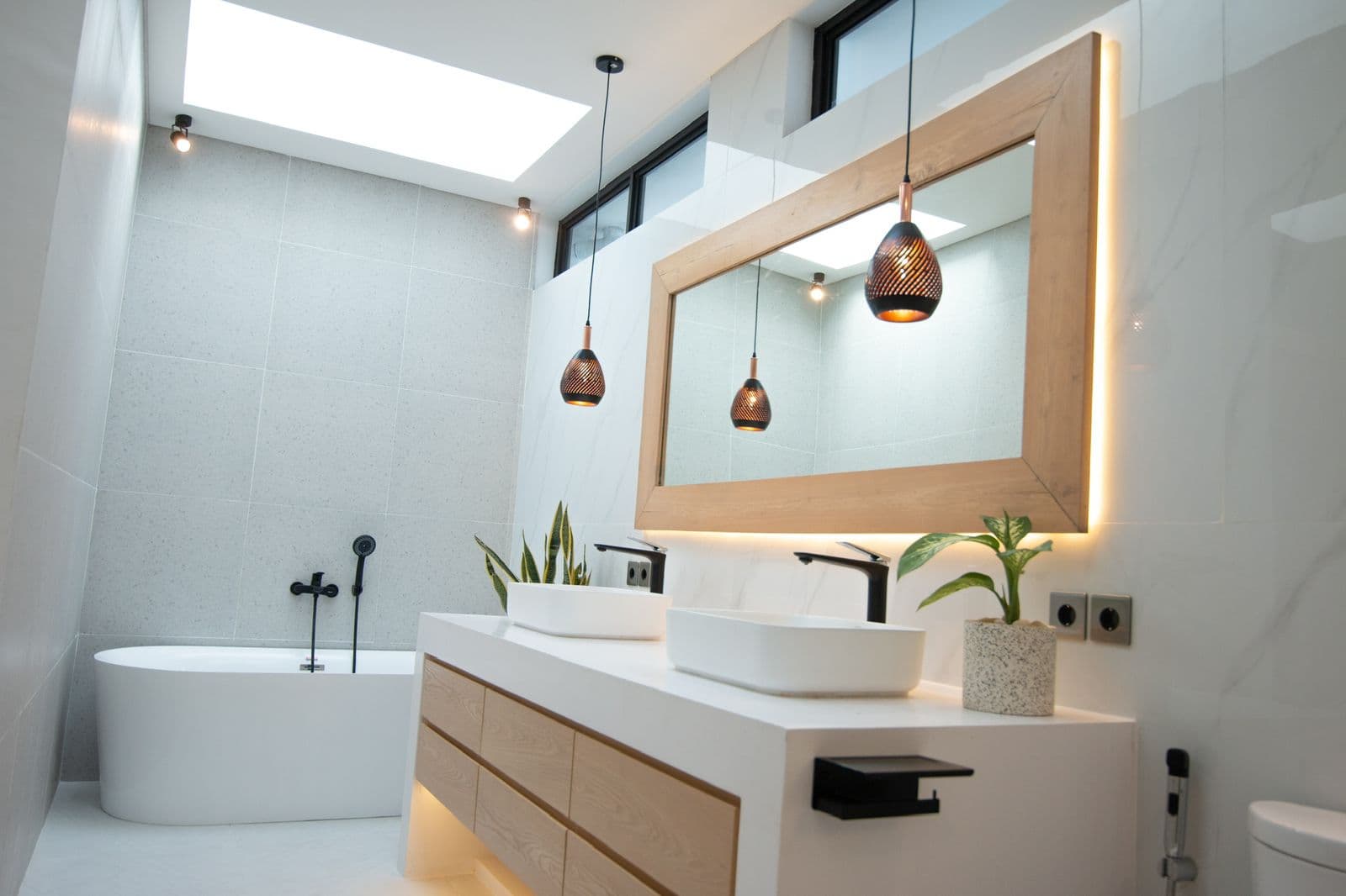 The Cottage — spa bathroom with soaking tub and skylight