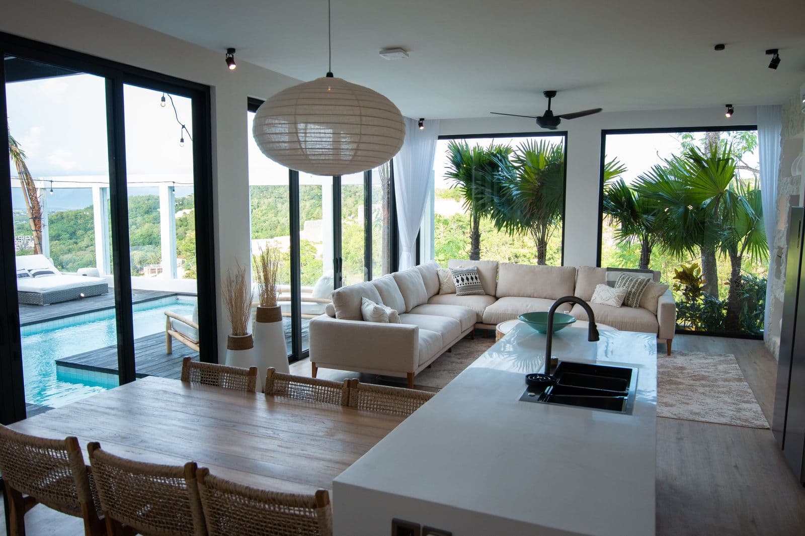 The Cottage — open plan living with pool view